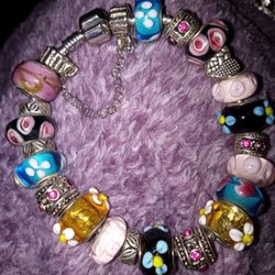 PANDORA SILVER CHARM BRACELET AND CHARMS