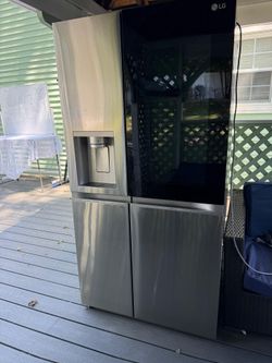 27 cu. ft. Side-By-Side InstaView Refrigerator