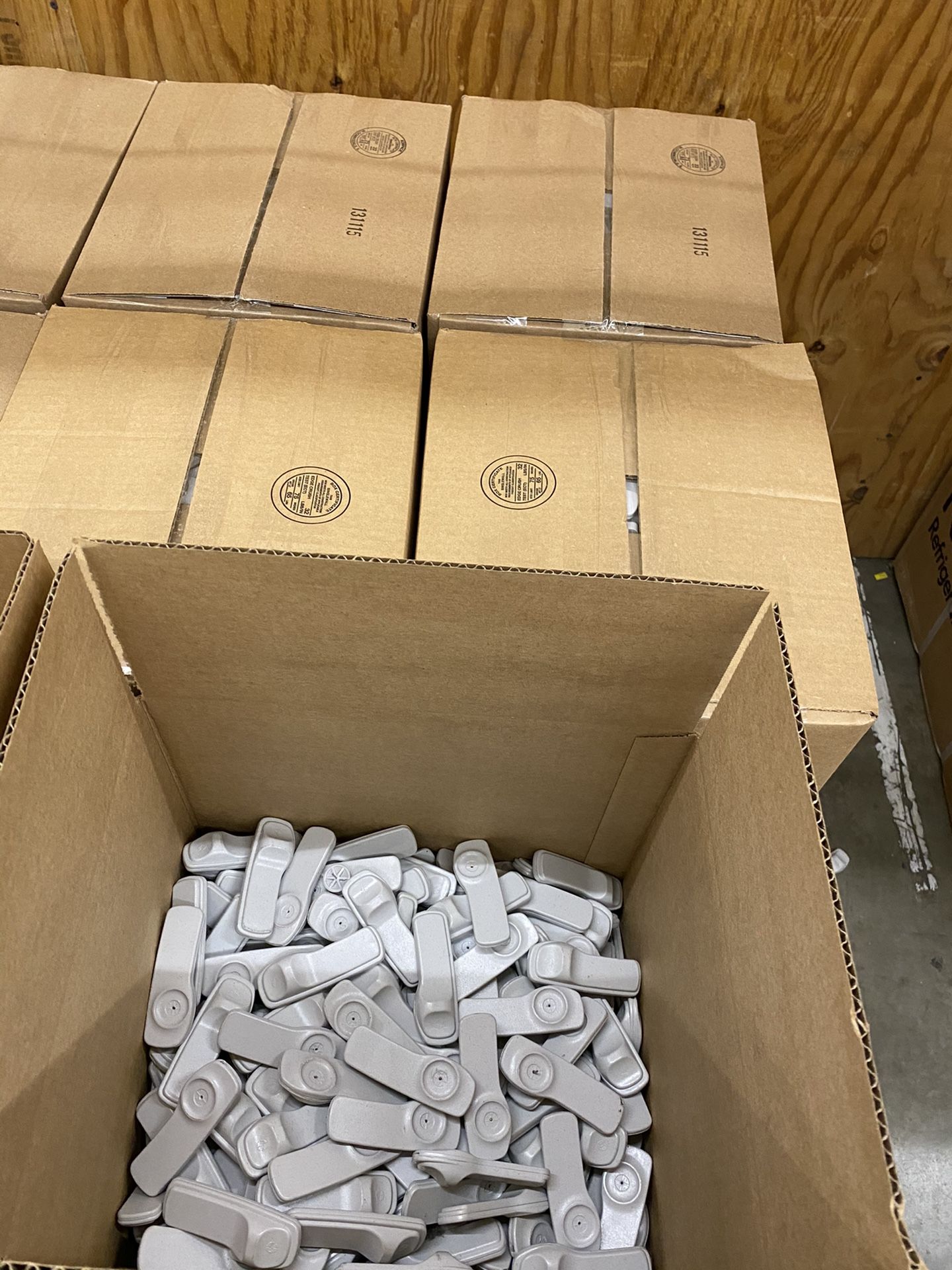 Pallets of clothing security tags