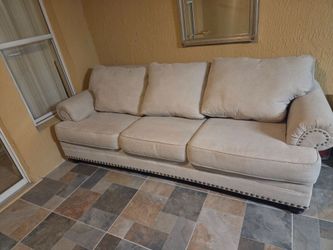 Light gray nailhead sofa