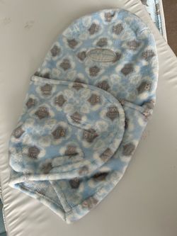 Newborn baby swaddles not used light blue and blue with design