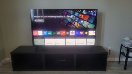 50 inch LG Smart TV and Entertainment Stand