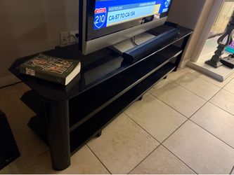 Glass TV  Stand…. MUST SELL FAST!