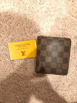 Louis Vuitton wallet with authenticity card
