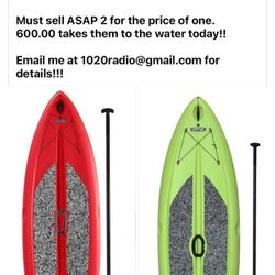 Paddle Boards And Canoe
