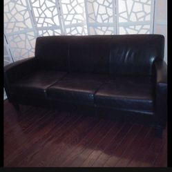BROWN REAL LEATHER COUCH - USED - NICE CONDITION. NO TEARS