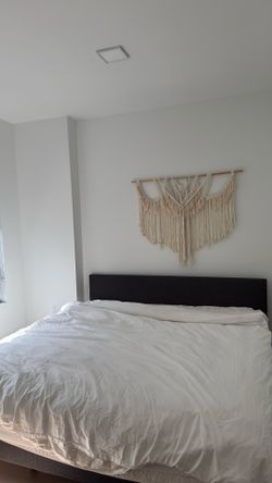 King size Upholstered bed frame with a mattress included