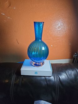 Antique vase with crystal blaz applied base.