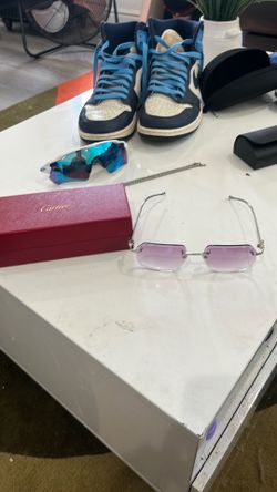 Size 10, Jordans Cartier glasses, Oakley glasses and diamond bracelets