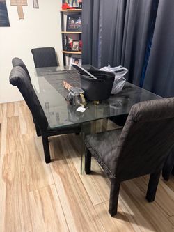 Glass table with 6 chairs