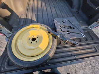 Compact Spare Tire with Jack and Tool Kit