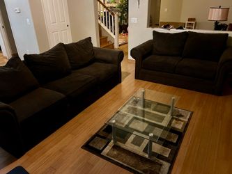 Couch and love seat with coffee table