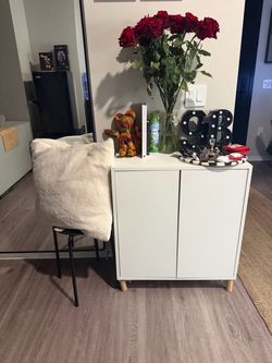 White Two-Door Storage Cabinet with Wood Legs