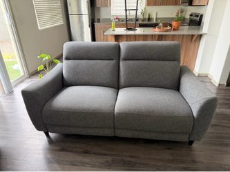 Gray electric reclining couches