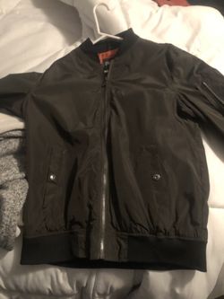 Olive green windbreaker