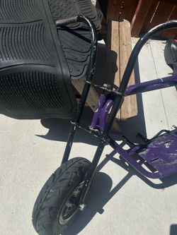 Mini bike roller  with wheelie bar