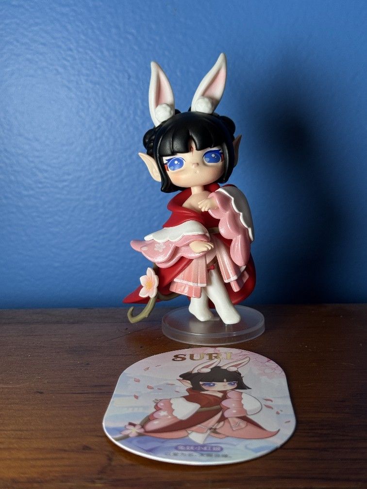Suri Collectible Figures