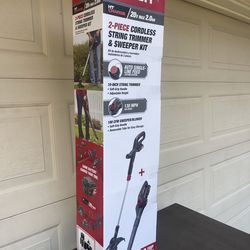 BRAND NEW IN BOX 2-PIECE CORDLESS STRING TRIMMER AND SWEEPER KIT wITH CHARGER AND BATTERY