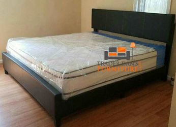 King size bed frame and a mattress