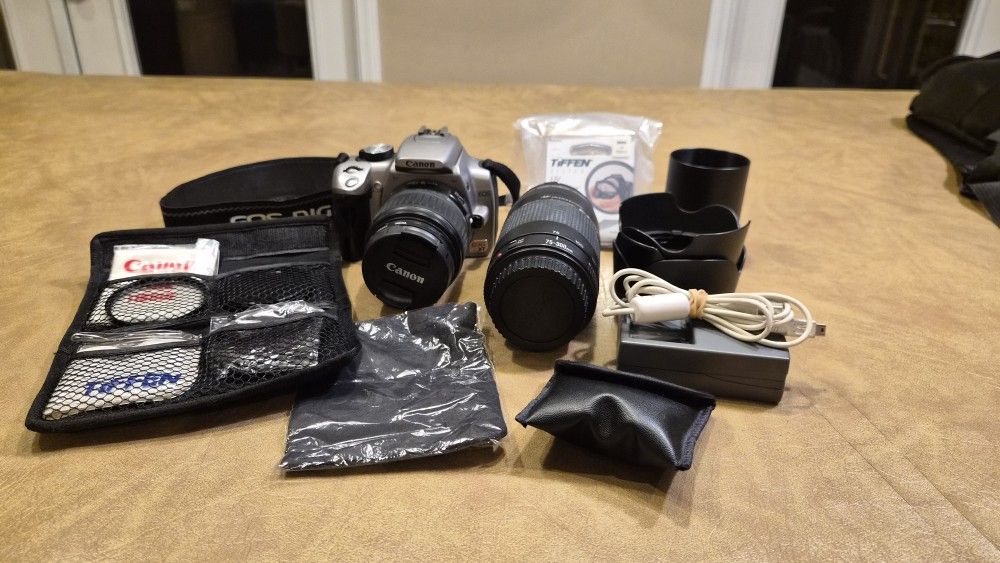Canon Rebel XT DSLR Kit – 2 Lenses + Accessories + Padded Backpack $180