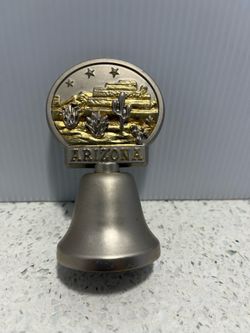 Arizona souvenir collectible dinner bell made of zinc alloy metal.