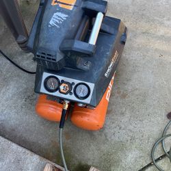 Ridgid  4.5 Portable quiet air Compressor Used Normal Wear Works Perfect 