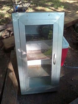Wall mount cabinet with glass door made of aluminum