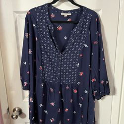 Women’s Size 2X (also Says 26/28) Navy Blue Blouse with little floral design.  Has 3/4 length sleeves.  Made of 100% Rayon.  Brand Woman Within.  Bran