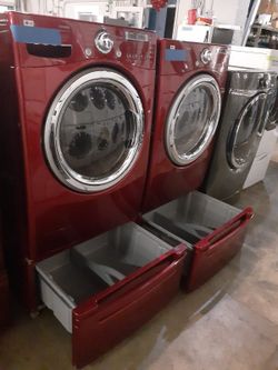 LG front load washer and electric dryer set with pedestal working perfectly with 4 months warranty