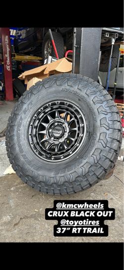 17” 6 Lug Kmc Crux Blackout with 37x12.50R17 Toyo RT Trail