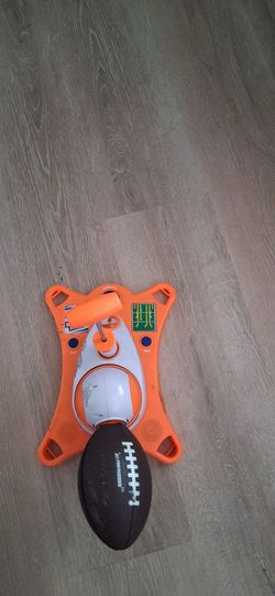 Foot ball launcher toy