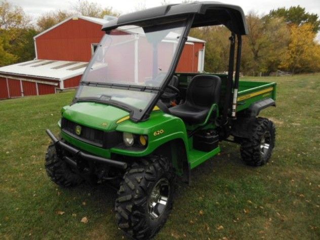 John Deere Gator XUV620I 4x4 condition stored inside adult owned