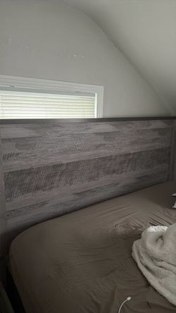 Gray king size head and foot board