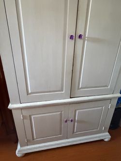 White Wood Armoire with Purple Knobs