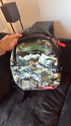 Money sprayground book bag