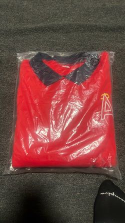 Angel’s polo sweater