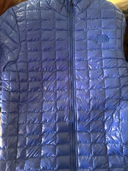 Mens small north face Puffer jacket with tags