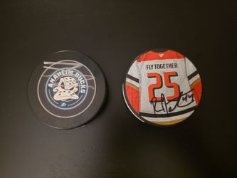 Anaheim Ducks signed pucks by Vatrano and Johnston