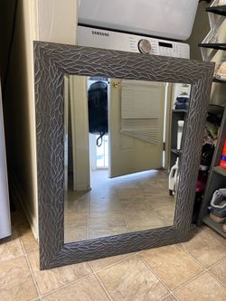 Silver border wall mirror
