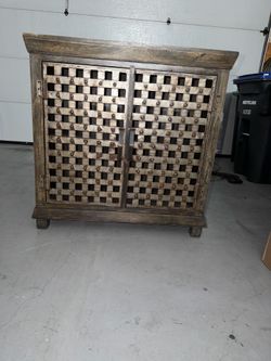 Rustic Wood Cabinet with Metal Lattice Doors