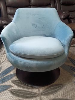 Blue velvet swivel accent chair