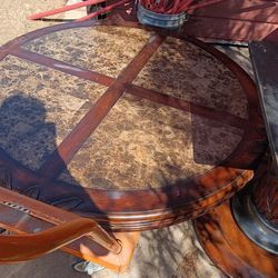 Dining table with pedestal