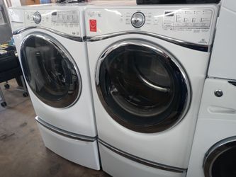 Whirlpool front load washer and dryer set on pedestals - Free delivery