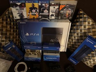 Sony PS4 Console Bundle with Games and Accessories