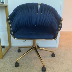 Blue cushioned Chair With Gold Metal Bars