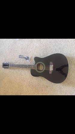 Brand new 12 string electric acoustic guitar