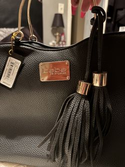 BEBE handbag With Gold Metal Hand Hold