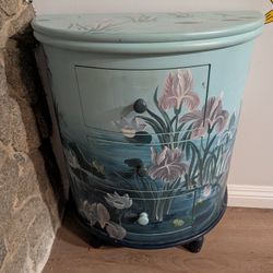 Hand-painted irises and water lilies on this cabinet 