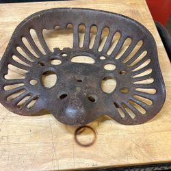 Vintage cast-iron tractor seat small piece, broken out of back retails for 190 selling for 75