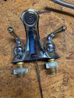 Moen Monticello Chrome and Polished Brass Bathroom Sink Faucet